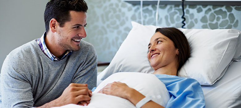 Couple dans une chambre d'hôpital | La Prévention Médicale